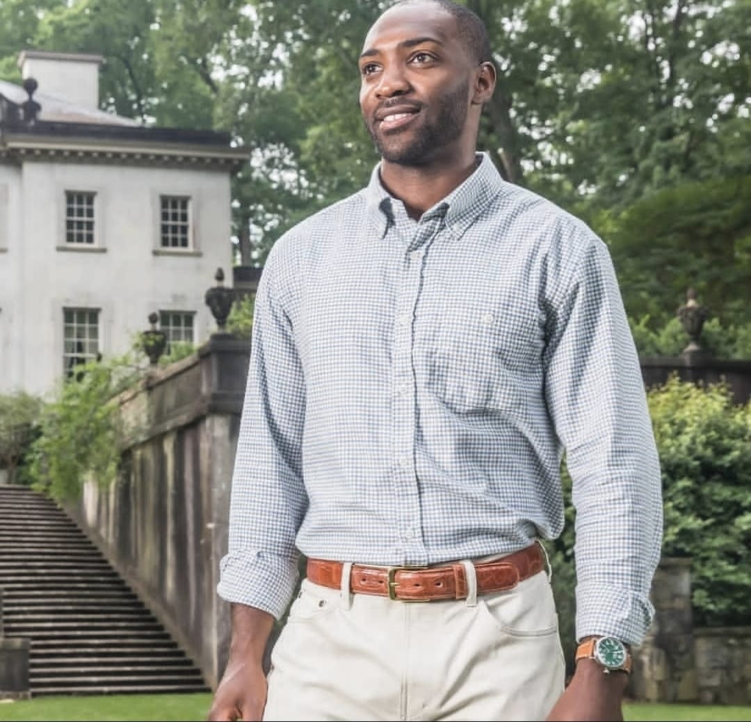 Man in check shirt outdoor portrait