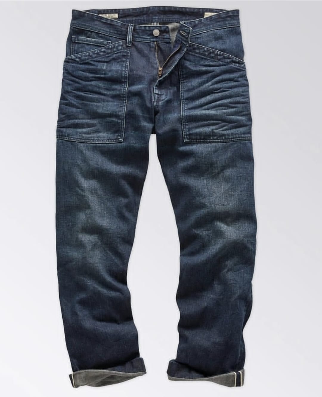 Dark blue denim jeans with cargo pockets